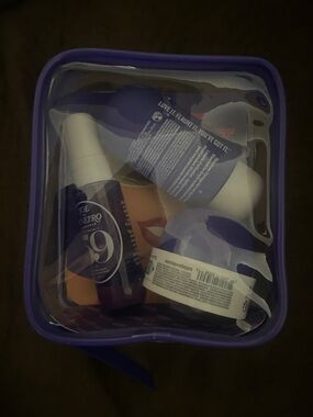 Sol de Janeiro Purple Clear Cosmetic Travel Bag with Assorted Skincare